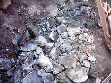 chemical agents producing small broken rock and concrete fragments